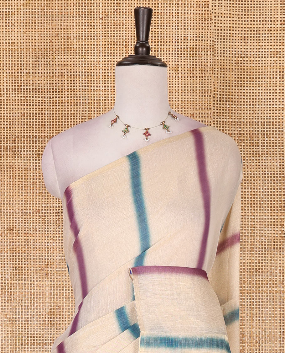 Borderless cream, colorful striped tissue saree, unique motifs printed blue color blouse
