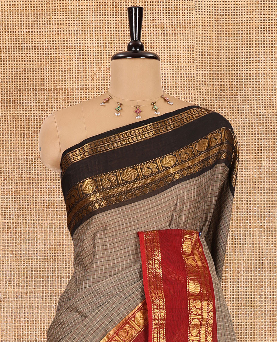 Beige plain chettinad cotton saree, contrast traditional zari rettai pettu ganga jamuna border, striped pallu, and a matching blouse