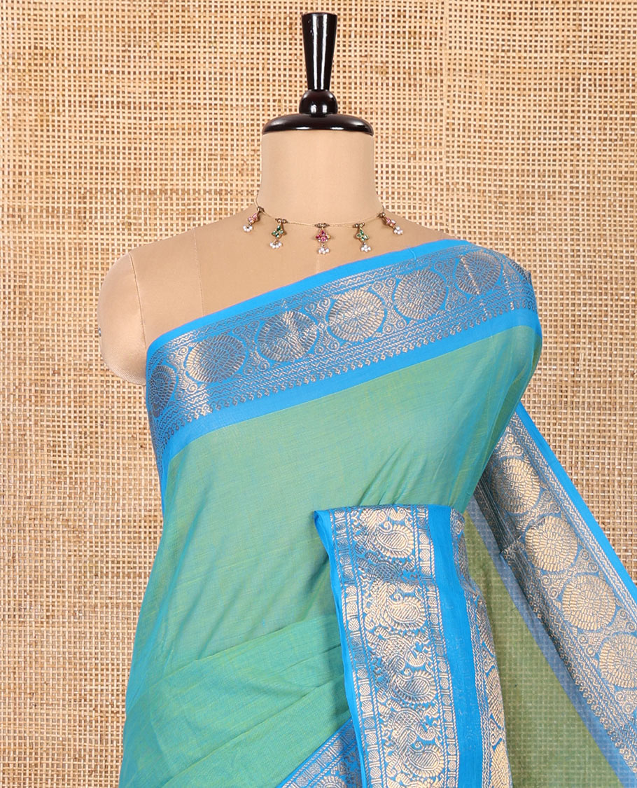 Blue Plain Chettinad Cotton Saree, Complemented by Contrast Rettai Pettu Traditional Zari Border of Peacock Chakram Designs, Pallu of Stripes, and Paired with a Matching Blouse
