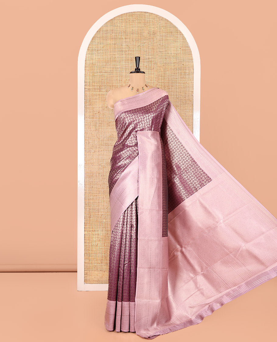 Purple Kanchi Silk Saree, Gleamed Up with Floral-Leaf Jacquard Design on Its Body, Complemented by a Contrast Traditional Zari Design Border, Intricately Designed Pallu, and Paired with a Contrast Blouse