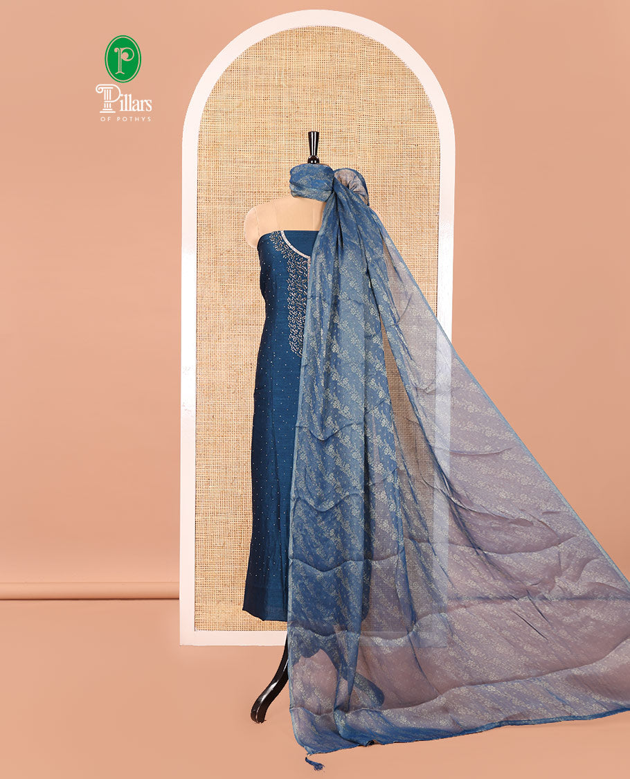 Blue Vichitra Silk Material Churidar Set, Gleamed Up with Swarovski Stone Work and Neck Work Top, Comes with a Plain Santoon Bottom, and Is Paired with Nc Moss Organza Floral Jaal Design Dupatta