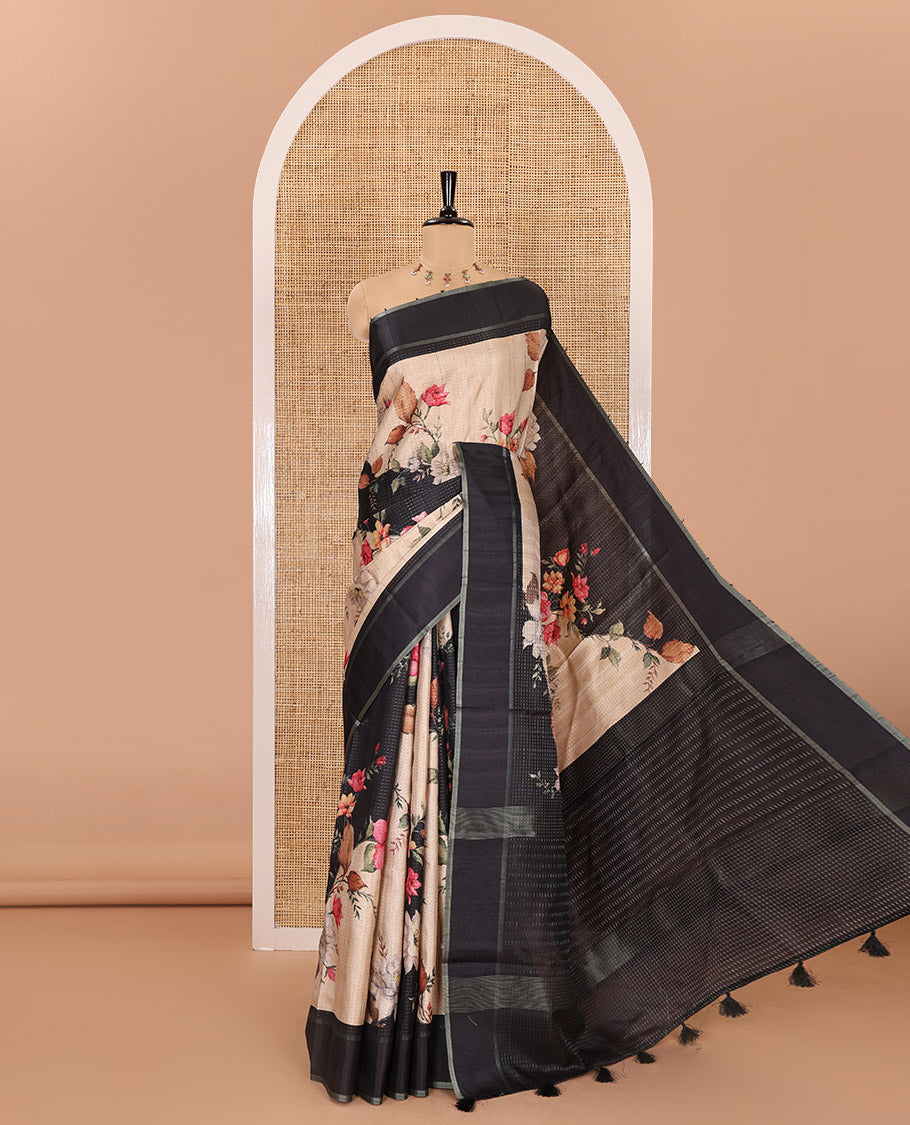 Black floral printed fancy tussar saree, contrast small zari border, and zari design pallu, and a contrast floral printed blouse