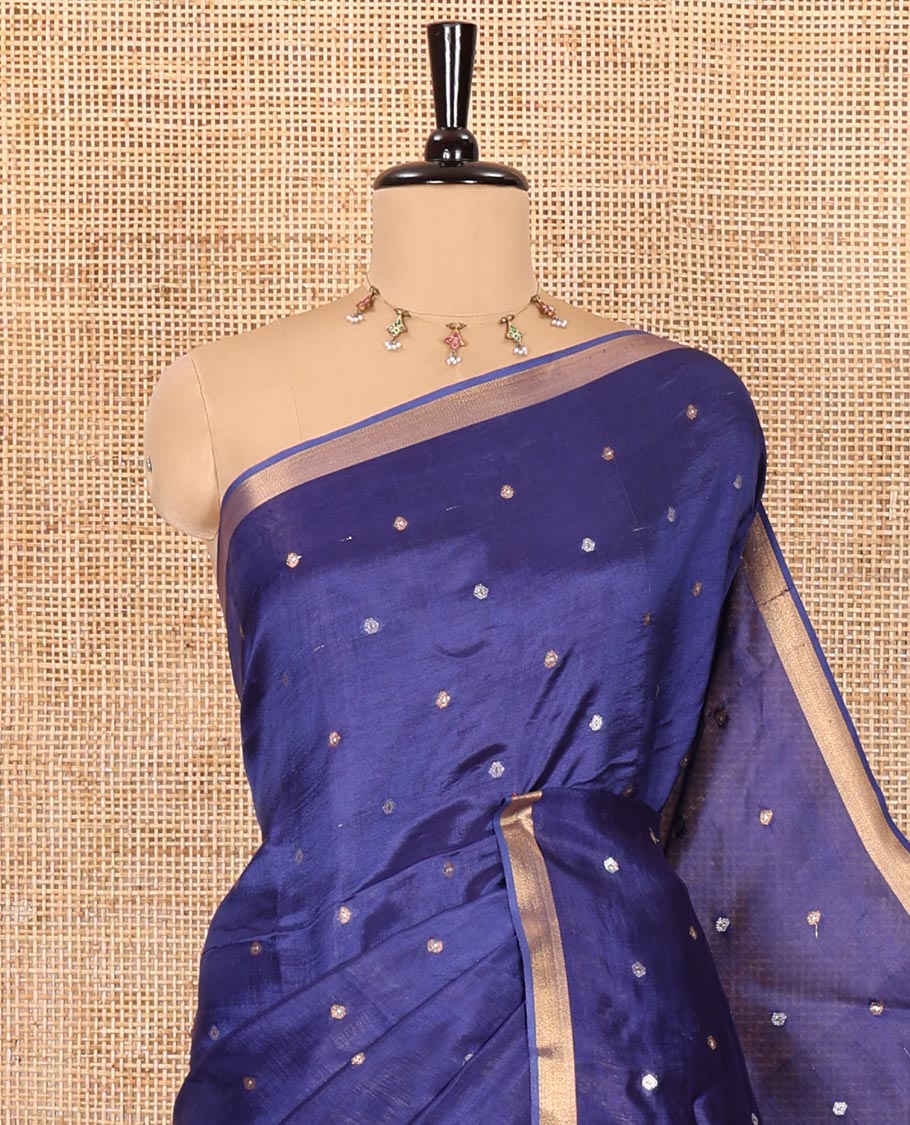 Royal blue zari buttas banana pith silk saree, zari bavanji border, zari striped pallu, and a matching zari design blouse