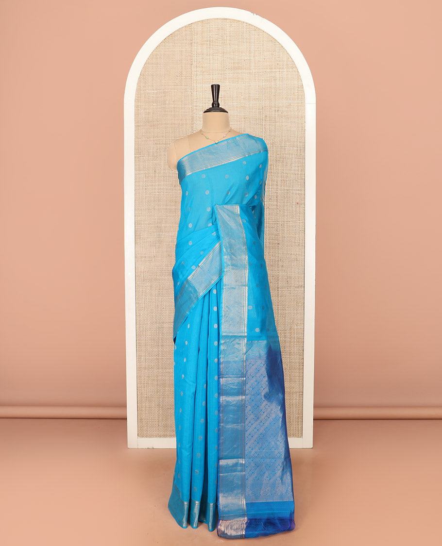 Blue Silk Cotton Saree Mesmerized with Polka Dot Buttas All Over the Body, Complemented by a Traditional Design Woven Border, Featuring a Pallu of Diagonal Designs, and Paired with a Contrast Blouse