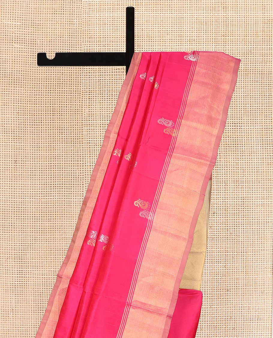 Pink Uppada Silk Saree, Graced with Zari Buttas All Over Its Body, Highlighted by a Zari Bavanji Border, Captivating Contrast Pallu of Zari Buttas, and Paired with a Contrast Blouse