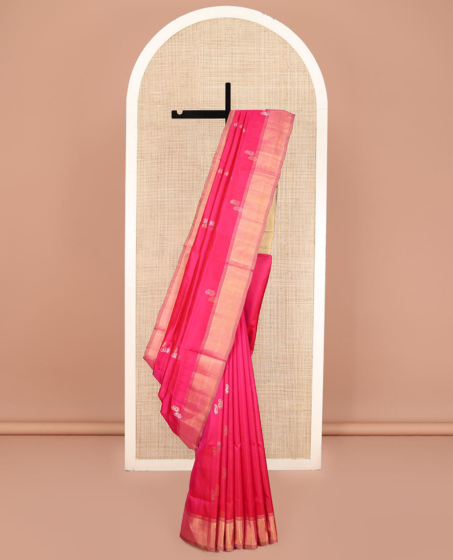 Pink Uppada Silk Saree, Graced with Zari Buttas All Over Its Body, Highlighted by a Zari Bavanji Border, Captivating Contrast Pallu of Zari Buttas, and Paired with a Contrast Blouse
