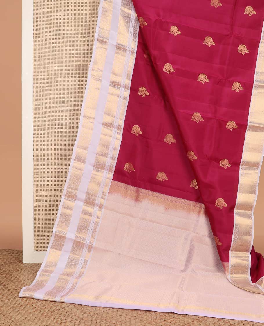 Red zari buttas Vasundhara silk mix saree, contrast border rettai pettu of thilakam, muthu, cross kamalam, neli, and mayil designs, and intricate pallu
