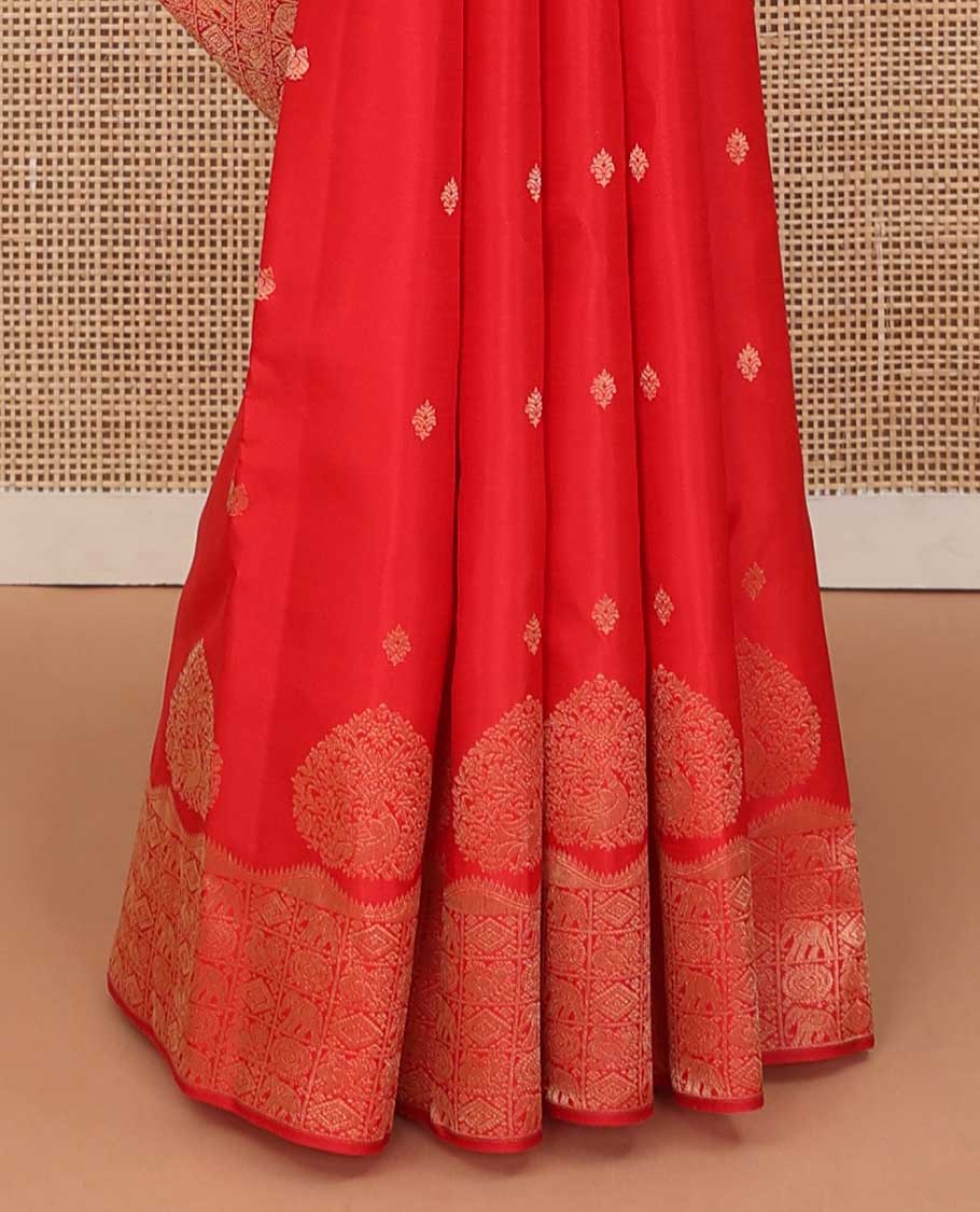 Red zari buttas silk saree, zari border and pallu of yanaai, diamond, chakram and mayil buttas enclosed checks