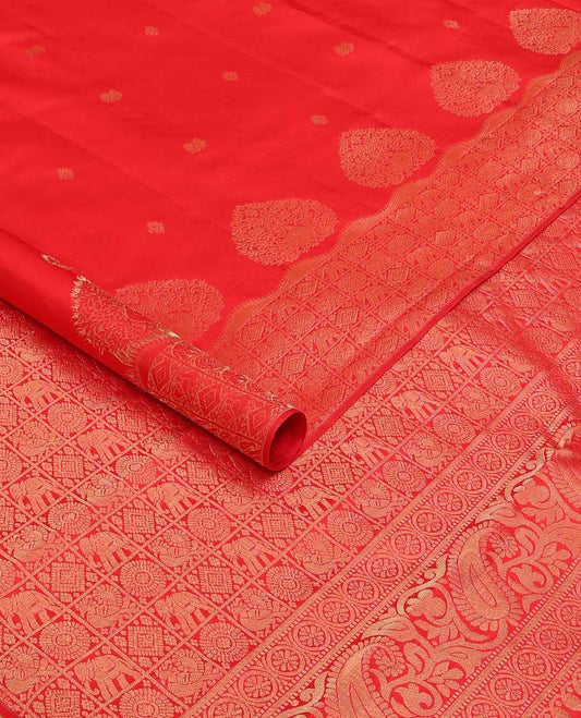 Red zari buttas silk saree, zari border and pallu of yanaai, diamond, chakram and mayil buttas enclosed checks