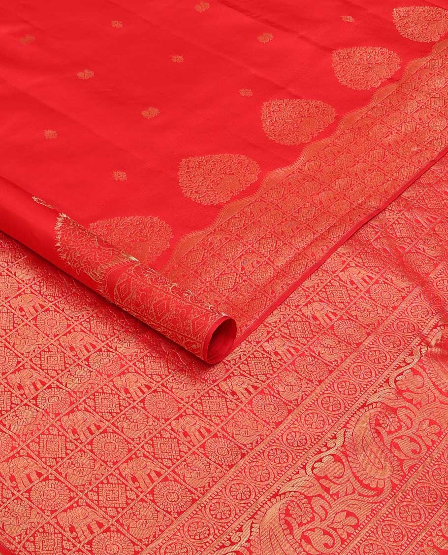 Red zari buttas silk saree, zari border and pallu of yanaai, diamond, chakram and mayil buttas enclosed checks
