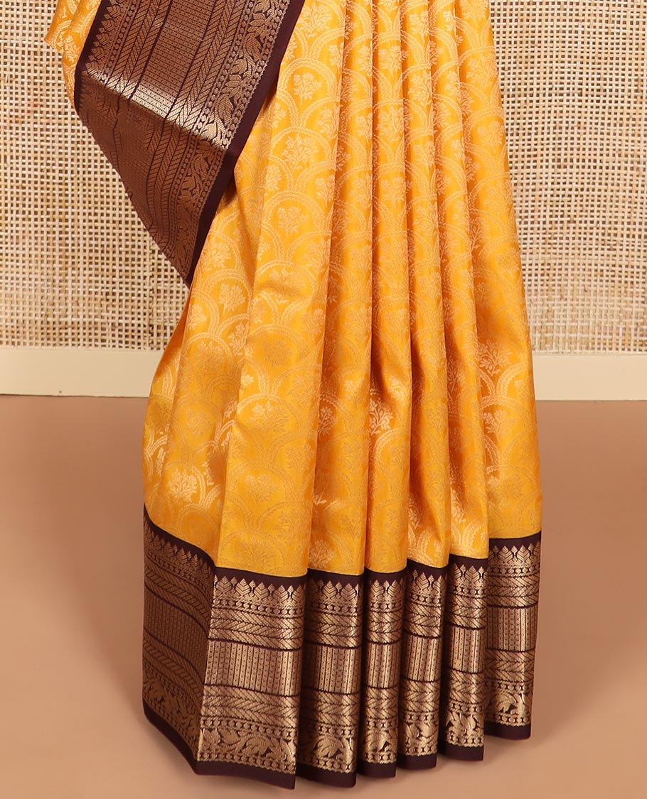 Orange floral jaal design kancheepuram silk saree with contrast border of thilakam mokku, banaras, muthu design & zari design pallu