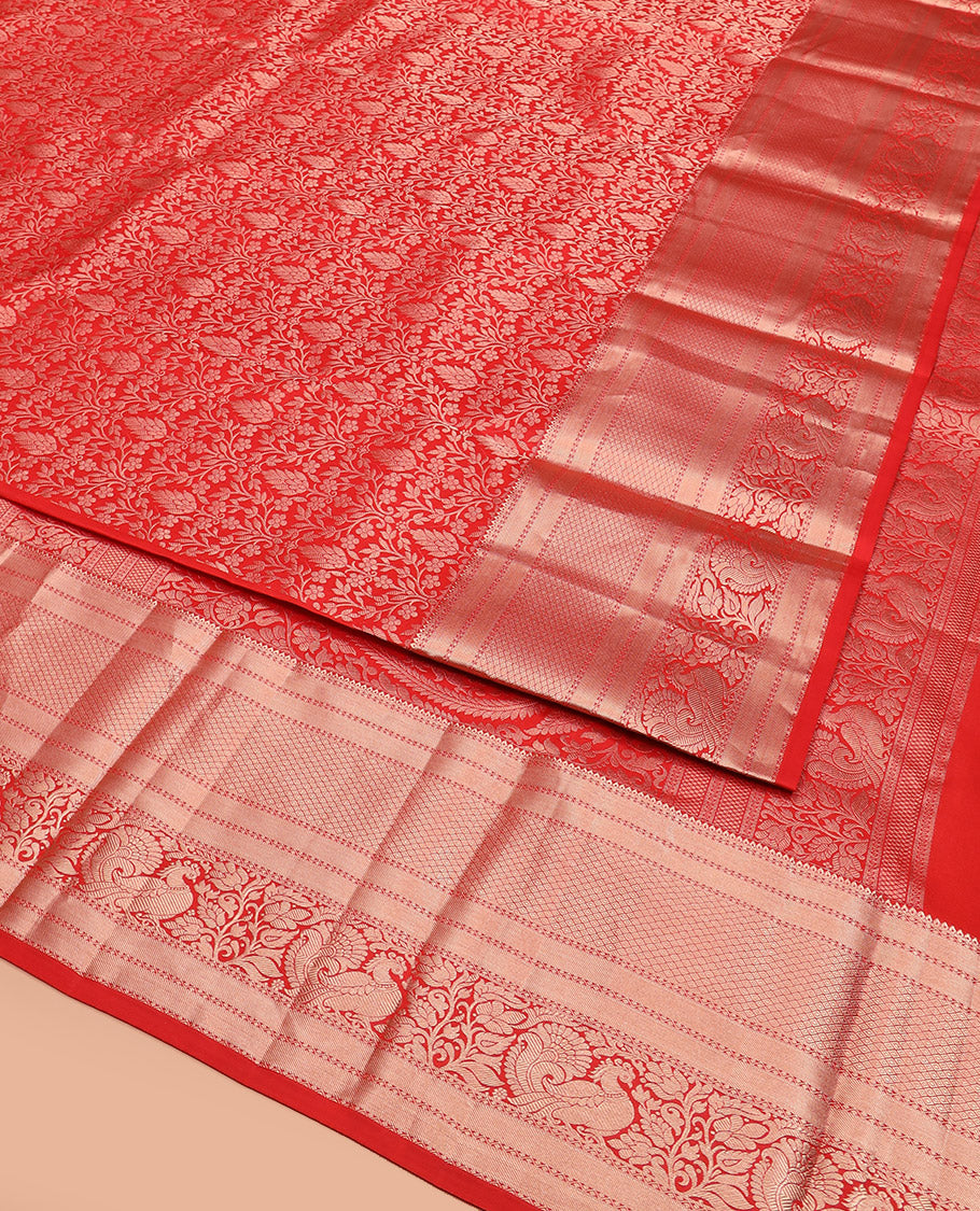 Red Kanchipuram Silk Saree Meticulously Designed with Floral Jaal Jacquard Design, Highlighted by Zari Border of Thilakam, Mayil Kann, Neli, and Mayil Designs, Gracefully Embellished Pallu, and Paired with a Matching Blouse