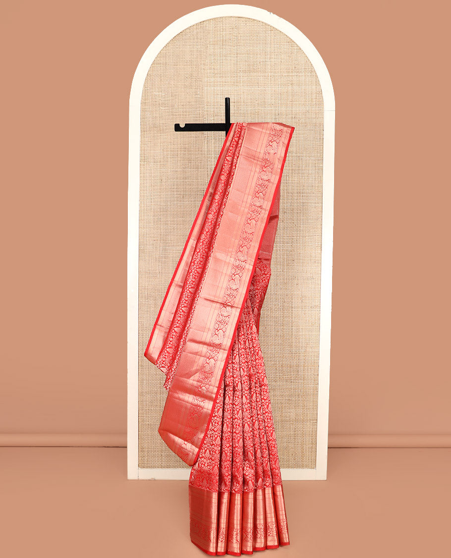 Red Kanchipuram Silk Saree Meticulously Designed with Floral Jaal Jacquard Design, Highlighted by Zari Border of Thilakam, Mayil Kann, Neli, and Mayil Designs, Gracefully Embellished Pallu, and Paired with a Matching Blouse