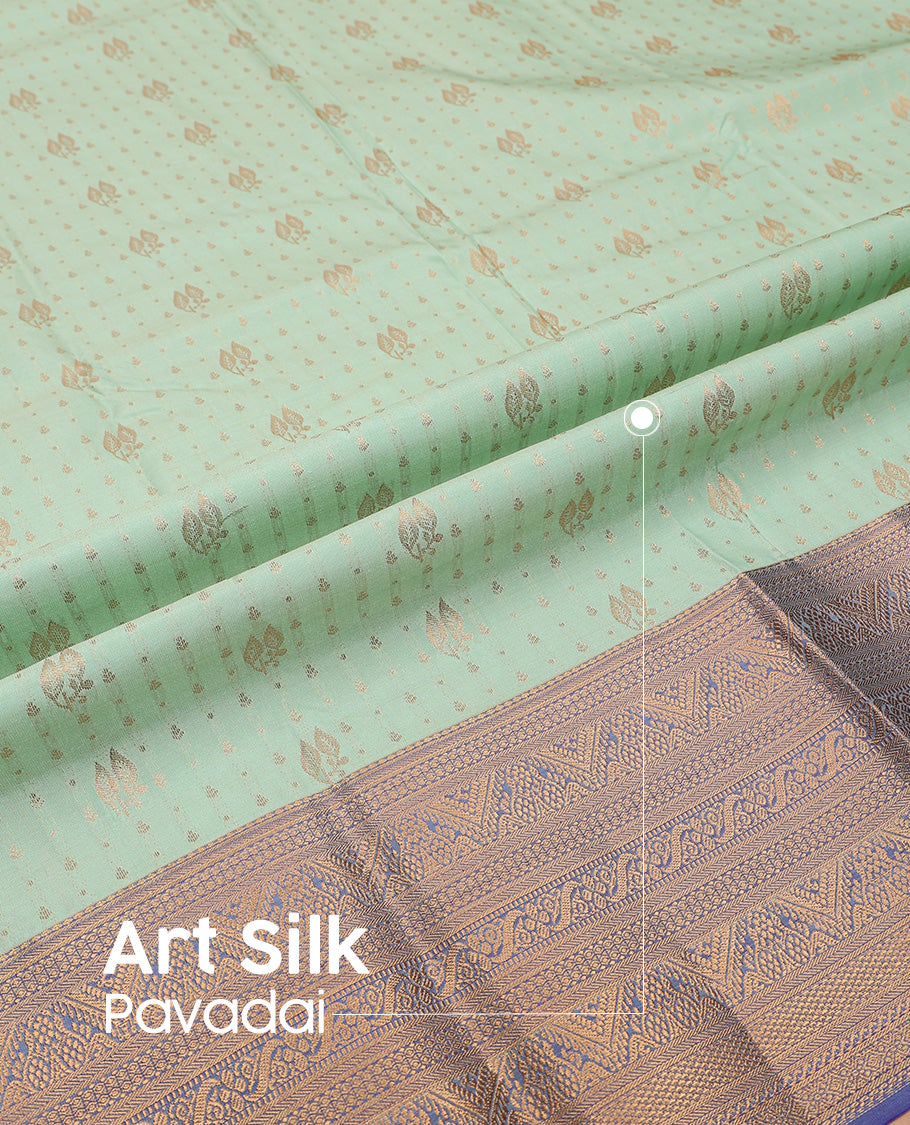 Pista green art silk pavadai set, zari design with contrast traditional zari bordered skirt and a contrast zari design blouse