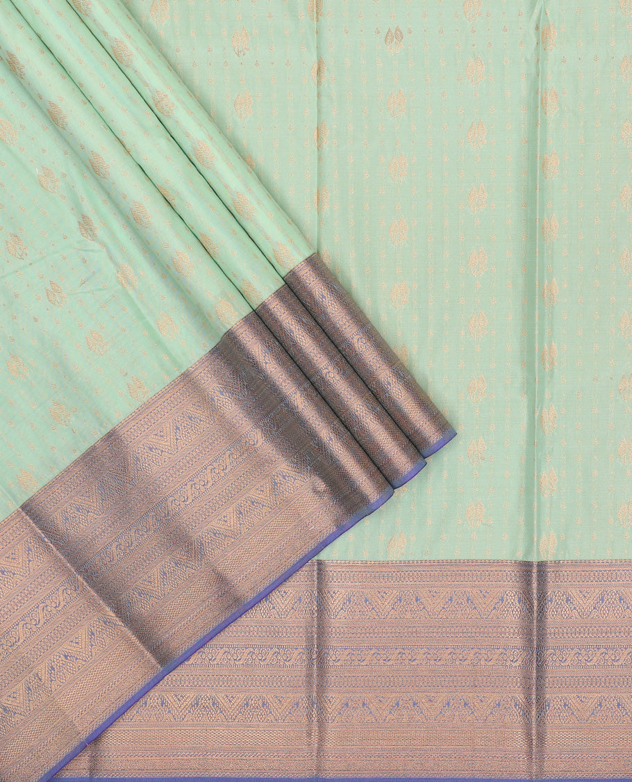 Pista green art silk pavadai set, zari design with contrast traditional zari bordered skirt and a contrast zari design blouse