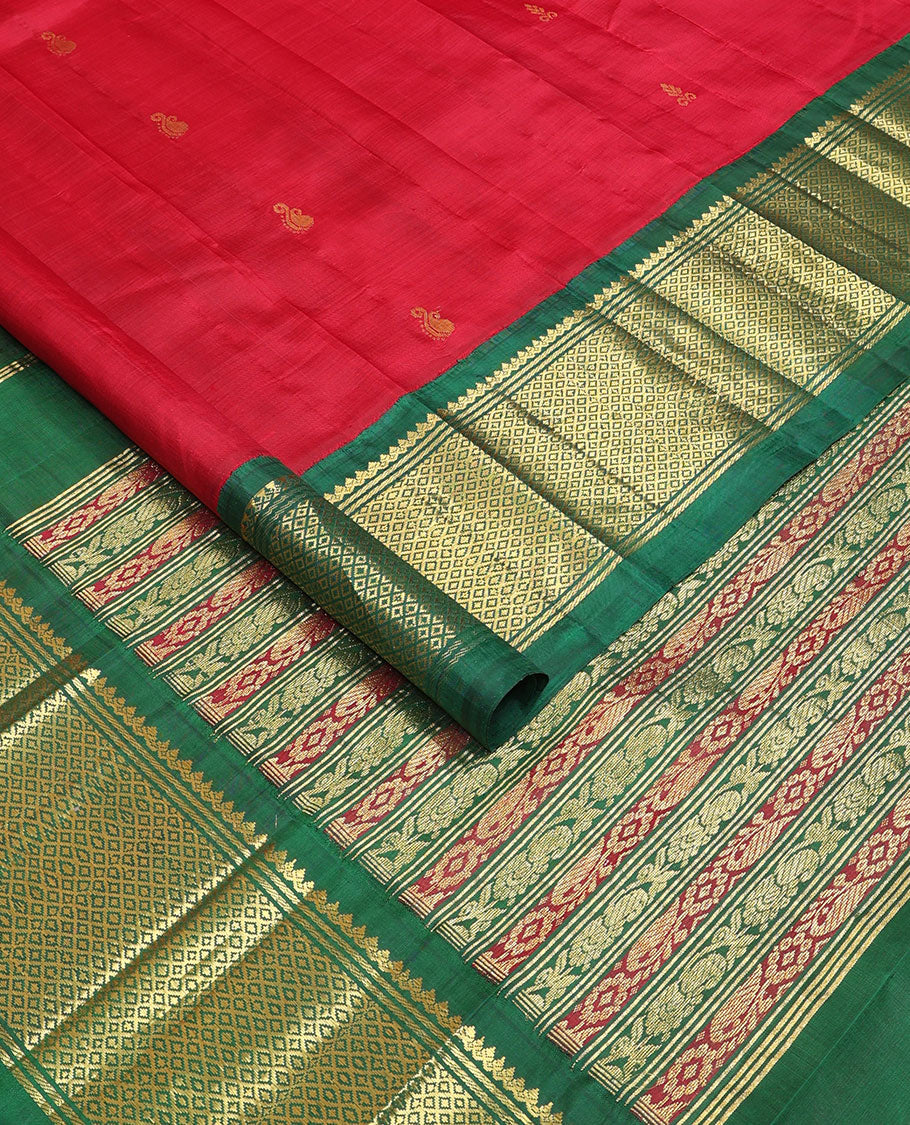 Red zari buttas Kanchipuram silksaree, contrast korvai one-sided border of thilakam mokku & mayil kann & pallu o kodi visiry
