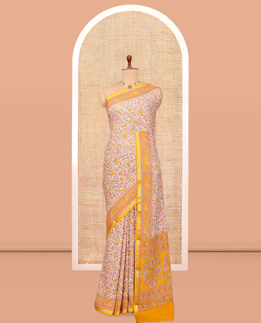 Off White Printed Silk Saree, Decorated with Floral-Vine Print, a Contrast Traditional Zari Border, Floral Pallu, and a Contrast Blouse