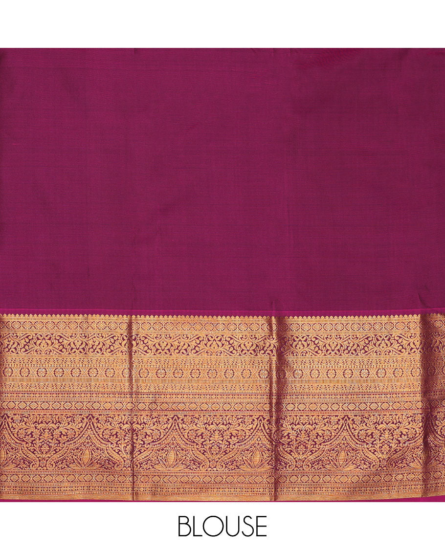 Green pure-silk half-saree, floral jacquard skirt, contrast blouse, and border of salangai, muthu, kamalam, kodi visiry and traditional designs, and intricate dhavani