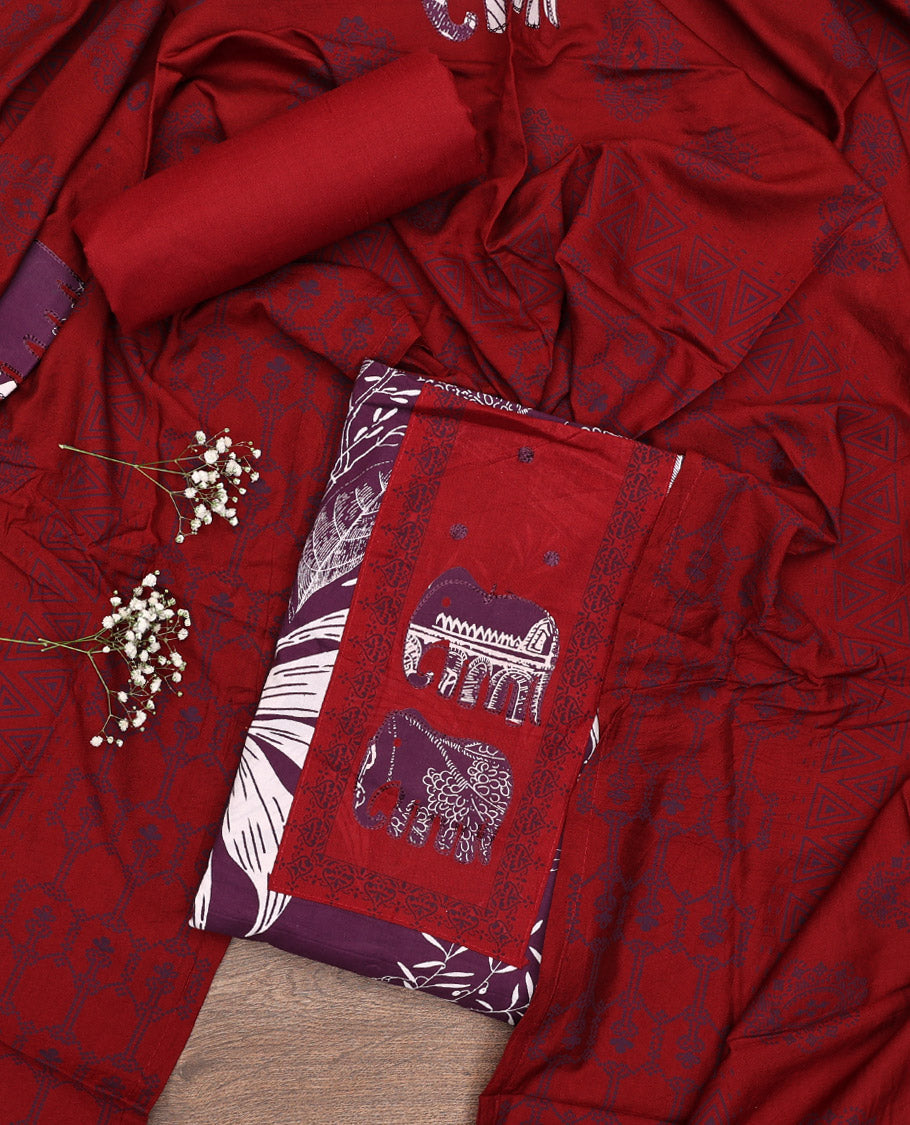 Purple Material Chudidar Set, Adorned with Tropical Floral and Building Print and Neck Embroidery on Cotton Top, a Contrast Plain Cotton Bottom, and Paired with a Geometric Printed Matching Cotton Dupatta