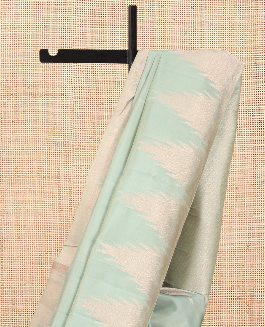 Turqoise Plain Vasundhara Lite Silk Mix Saree, a Zari Thazhampoo Rekku Border, Grand Jaal Pallu, and a Matching Blouse