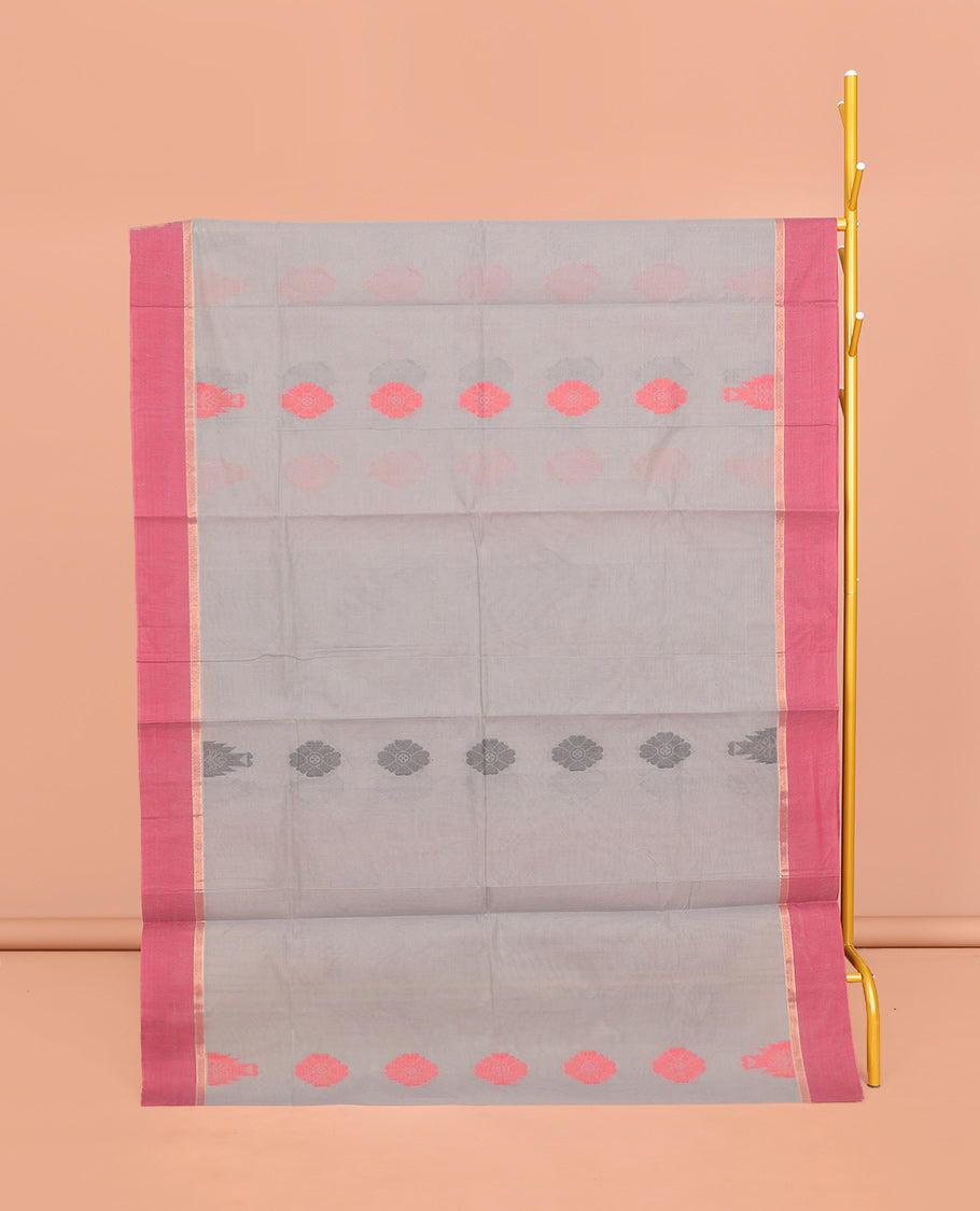 Grey Coimbatore Cotton Saree, Decked Up with Buttas, a Contrast Temple Border, a Pallu of Intricate Design, and a Matching Blouse