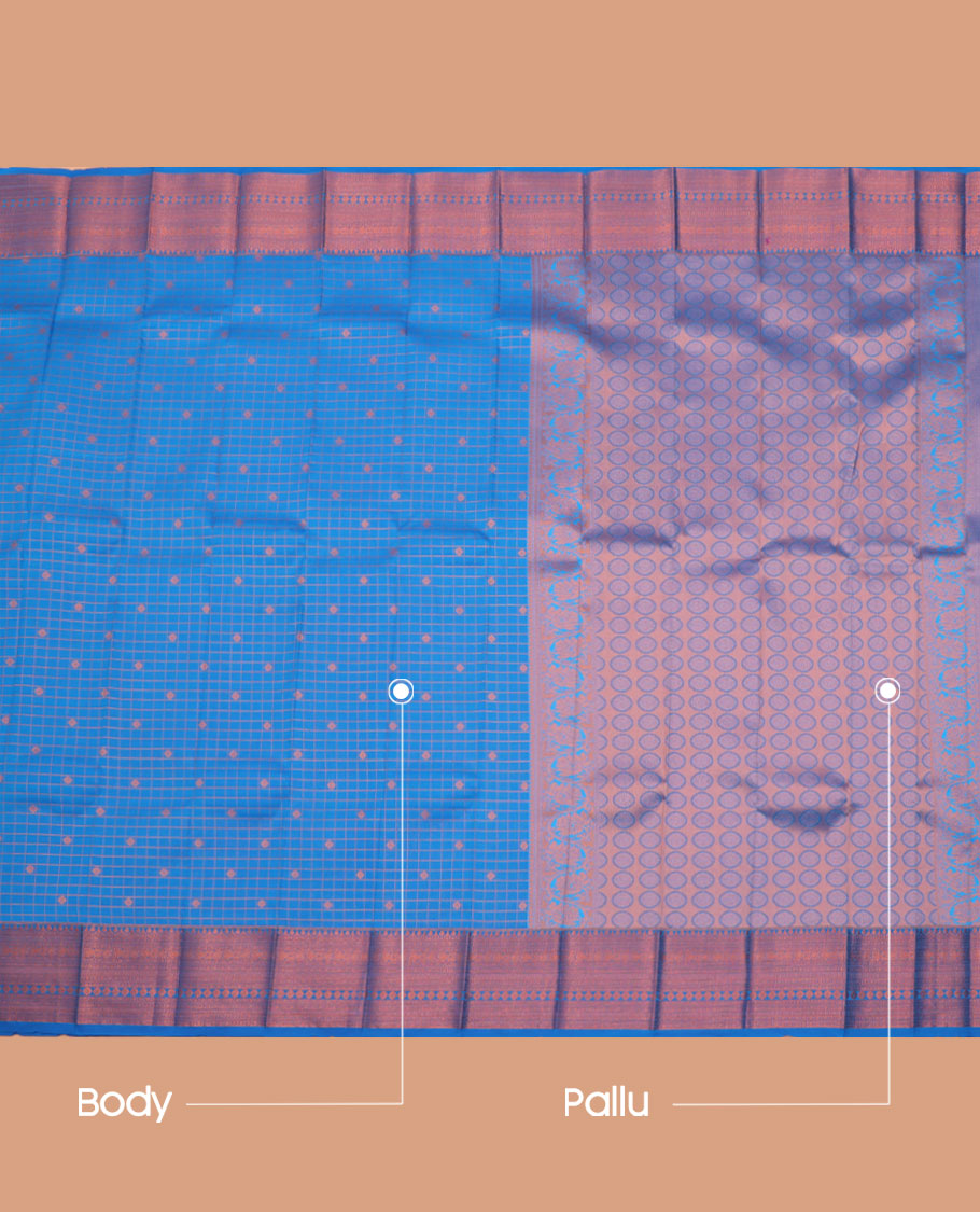 Blue Budget Silk Saree, Detailed with Zari Buttas and Checks All Over Its Body, Highlighted by a Traditional Zari Design Border, Grand Pallu, and Paired with a Matching Blouse