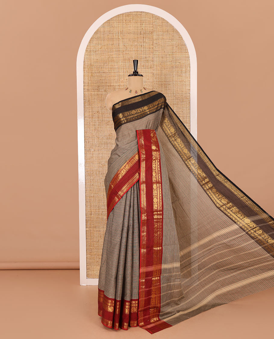 Beige plain chettinad cotton saree, contrast traditional zari rettai pettu ganga jamuna border, striped pallu, and a matching blouse