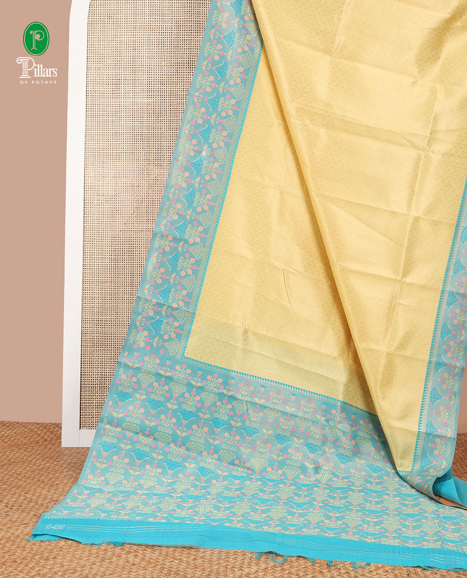 Yellow copper zari weaving litchi silk saree with contrast meena butta border & meena style design pallu along with contrast blouse