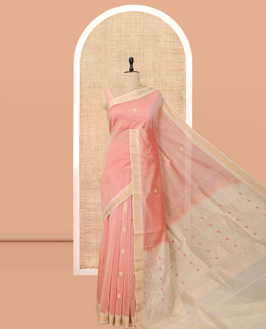 Peach Silk Cotton Saree, Sparsely Woven with Buttas, a Contrast Zari Border, Intricately Designed Pallu, and a Contrast Blouse