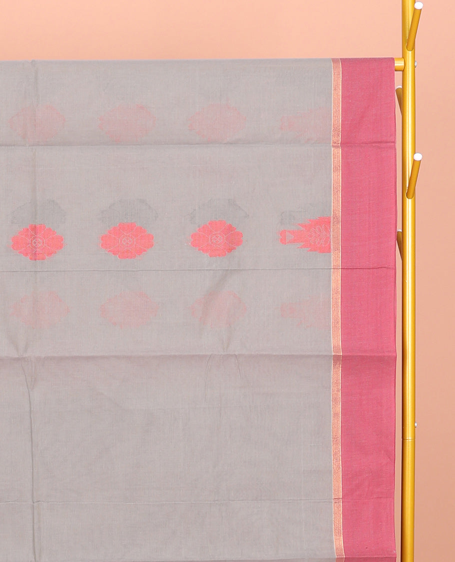 Grey Coimbatore Cotton Saree, Decked Up with Buttas, a Contrast Temple Border, a Pallu of Intricate Design, and a Matching Blouse