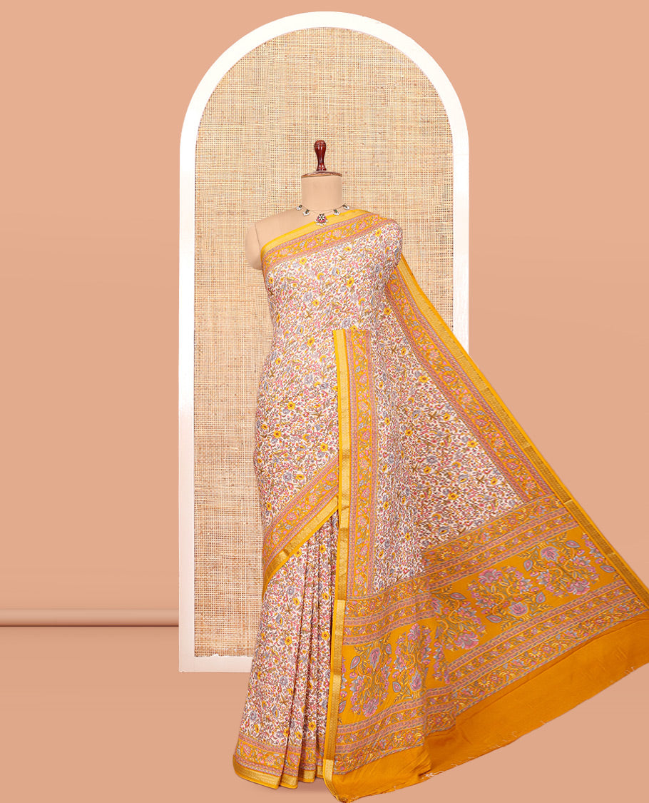 Off White Printed Silk Saree, Decorated with Floral-Vine Print, a Contrast Traditional Zari Border, Floral Pallu, and a Contrast Blouse
