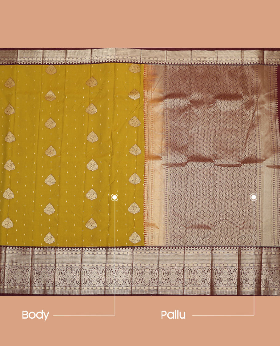 Mustard Budget Silk Saree, Steeped in Richness of Zari Buttas on Its Body, Complemented by a Contrast Traditional Zari Design Border, Pallu of Geometric Design, and Paired with a Contrast Blouse