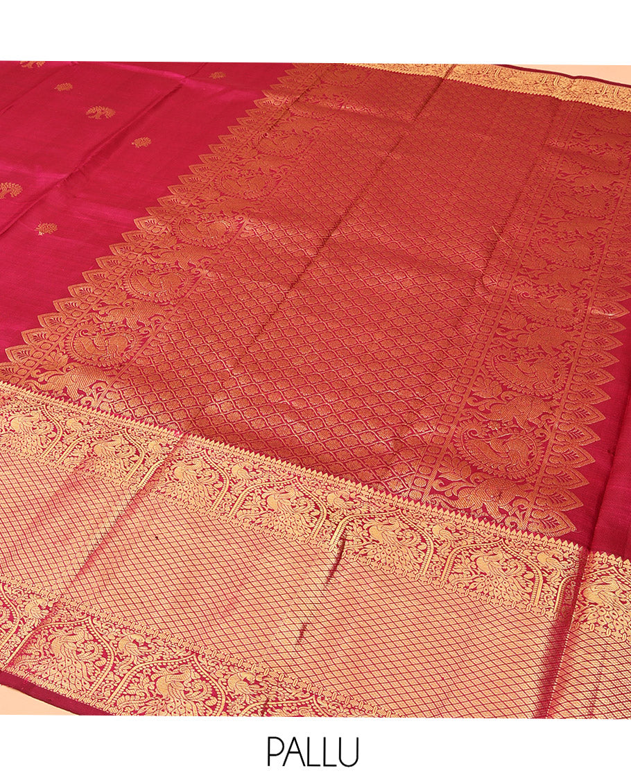 Purple Kanchipuram Silk Saree, Meticulously Crafted with Zari Buttas All Over Its Body, Highlighted by a Zari Border of Rekku, Paisa, Mayil, and Jaal Designs, Pallu of Ogee Patterns, and Paired with a Matching Blouse