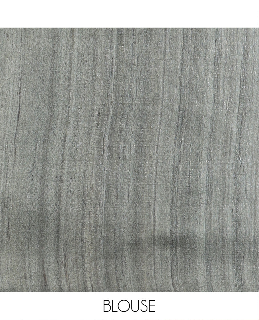 Light sandal plain tussar saree, contrast temple border, and geometric patterned pallu