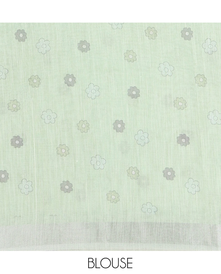 Cream and Green Linen Cotton Saree, Beautified with Ombre-Style Double-Color Print, Highlighted by Contrast Zari Bavanji Border, Pallu Pictures Floral Prints, and Paired with a Floral Printed Blouse