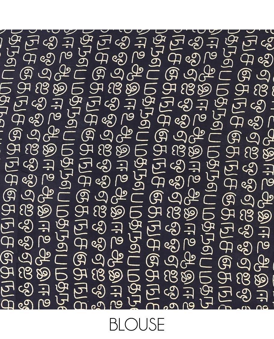 Borderless white Tamil letters printed Sungudi cotton saree with contrast Tamil letters printed blouse