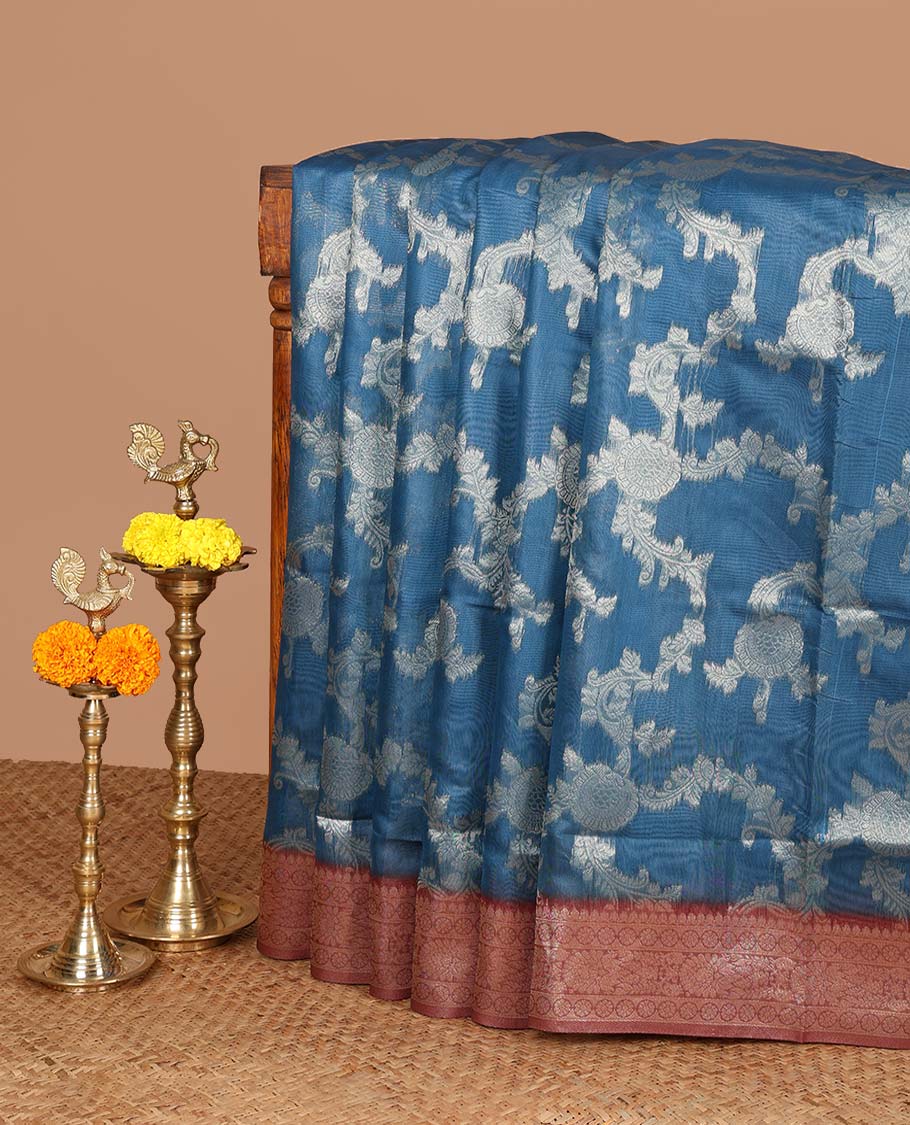 Blue jaal zari weaving banaras brasso saree with contrast jacquard border & rich weaving pallu along with butta design blouse