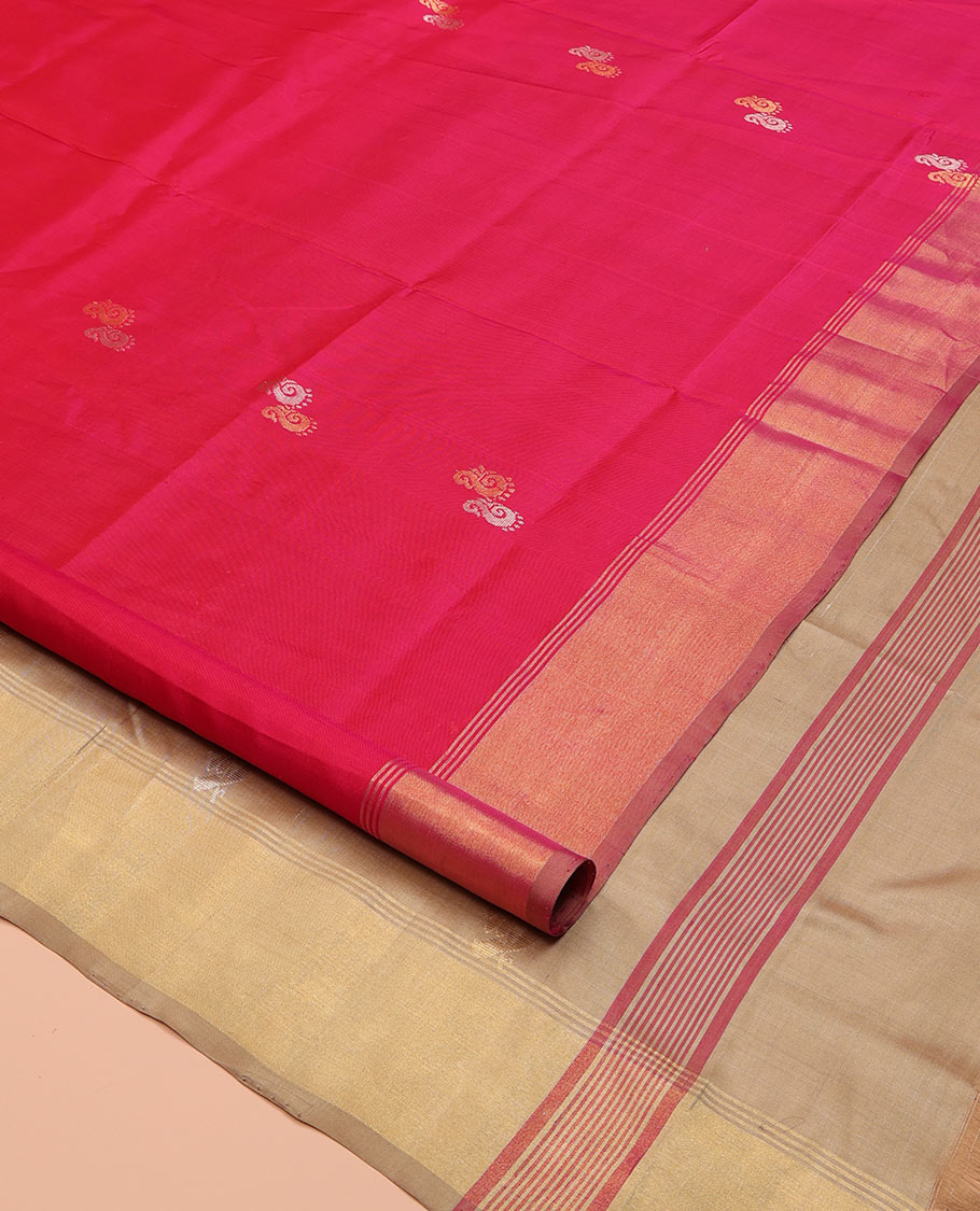 Pink Uppada Silk Saree, Graced with Zari Buttas All Over Its Body, Highlighted by a Zari Bavanji Border, Captivating Contrast Pallu of Zari Buttas, and Paired with a Contrast Blouse