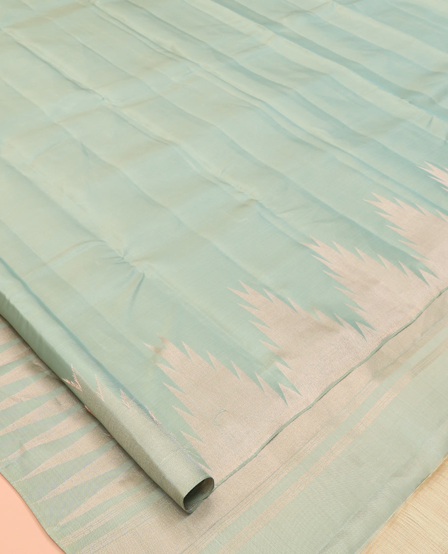 Turqoise Plain Vasundhara Lite Silk Mix Saree, a Zari Thazhampoo Rekku Border, Grand Jaal Pallu, and a Matching Blouse