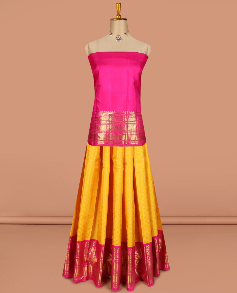 Yellow pure silk half saree, kamalam buttas skirt, contrast border, and blouse of rekku,muthu,kathir,chakram,mayil and kuyil kann, and zari checked dhavani