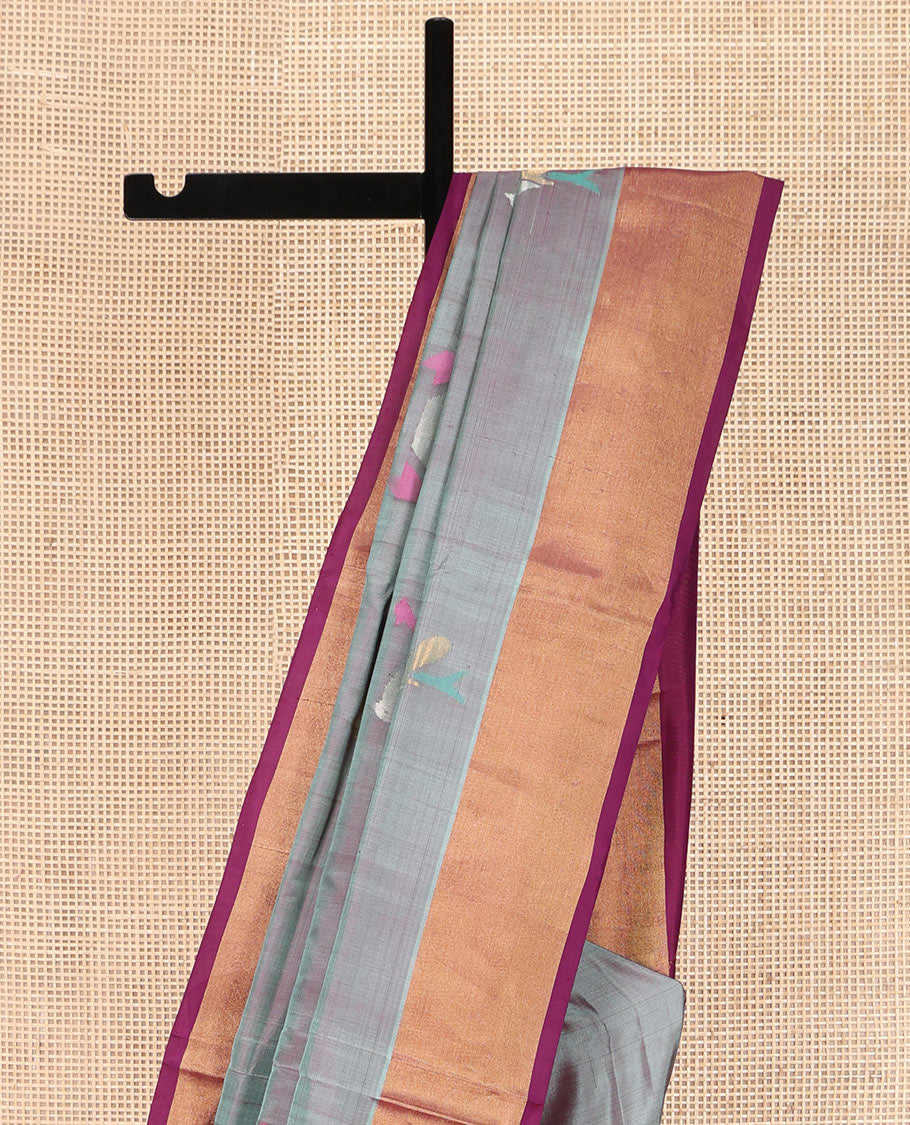Grey Uppada Silk Saree, Elevated with Meena Buttas All Over Its Body, Complemented by Contrast Zari Bavanji Border, Captivating Contrast Pallu Steeped with Meena Buttas, and Paired with a Contrast Blouse