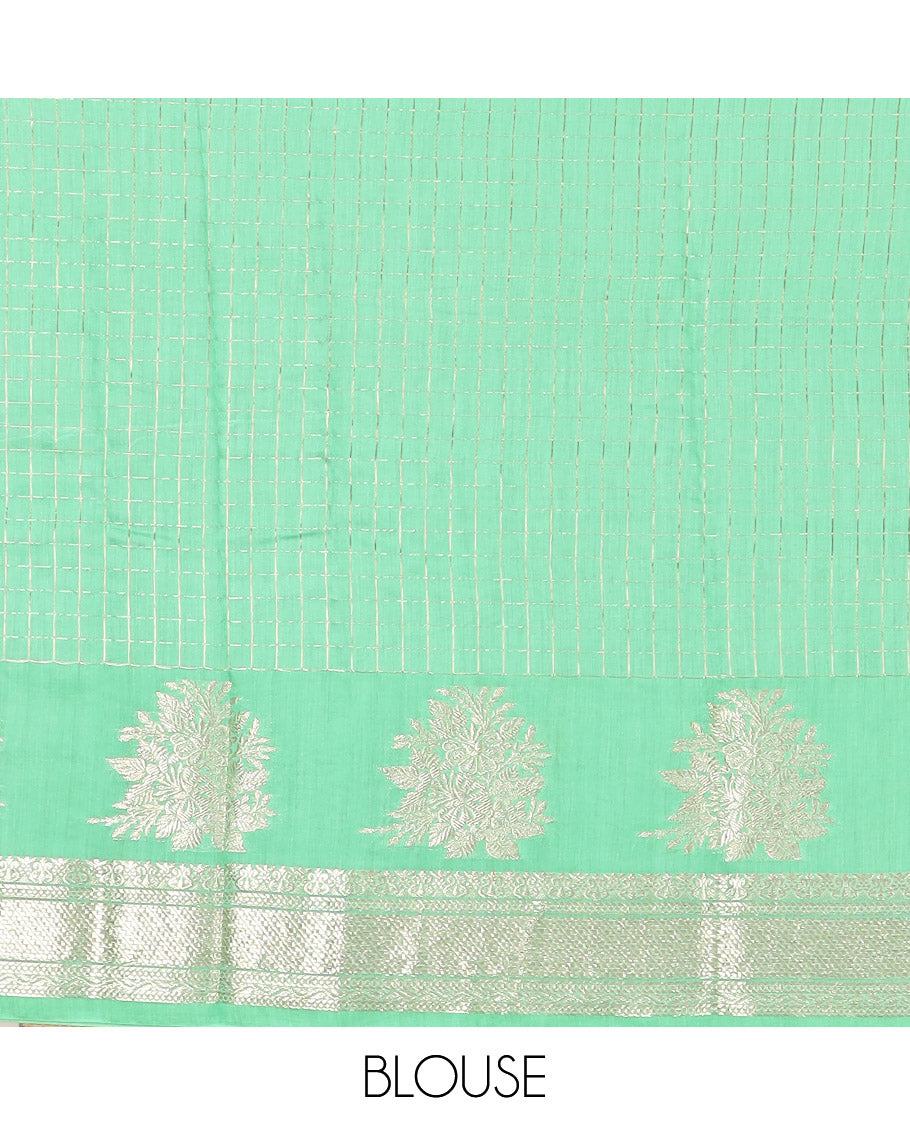 Navy Blue Assam Silk Saree Subtly Sparkled with Zari Checks, Complemented by Contrast Traditional Zari Border of Floral Designs, a Captivating Pallu of Zari Stripes, and Paired with a Contrast Blouse