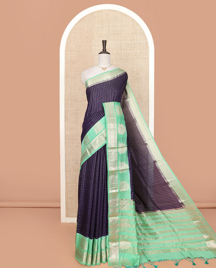 Navy Blue Assam Silk Saree Subtly Sparkled with Zari Checks, Complemented by Contrast Traditional Zari Border of Floral Designs, a Captivating Pallu of Zari Stripes, and Paired with a Contrast Blouse