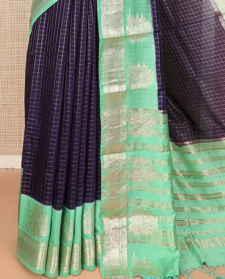 Navy Blue Assam Silk Saree Subtly Sparkled with Zari Checks, Complemented by Contrast Traditional Zari Border of Floral Designs, a Captivating Pallu of Zari Stripes, and Paired with a Contrast Blouse