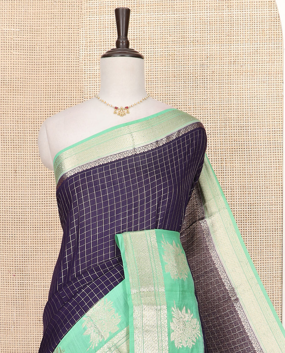 Navy Blue Assam Silk Saree Subtly Sparkled with Zari Checks, Complemented by Contrast Traditional Zari Border of Floral Designs, a Captivating Pallu of Zari Stripes, and Paired with a Contrast Blouse