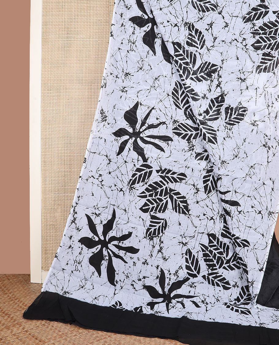 Borderless white and black batik floral and leaf printed mixed cotton saree