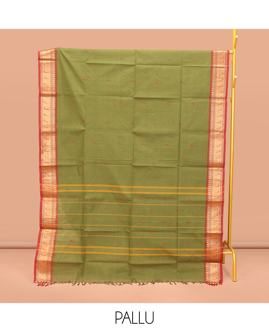 Green Chettinad Cotton Saree, Steeped with Muniya Buttas On Its Body, Complemented by a Contrast Traditional Muniya Border, Pallu of Stripes, and Paired with a Matching Blouse