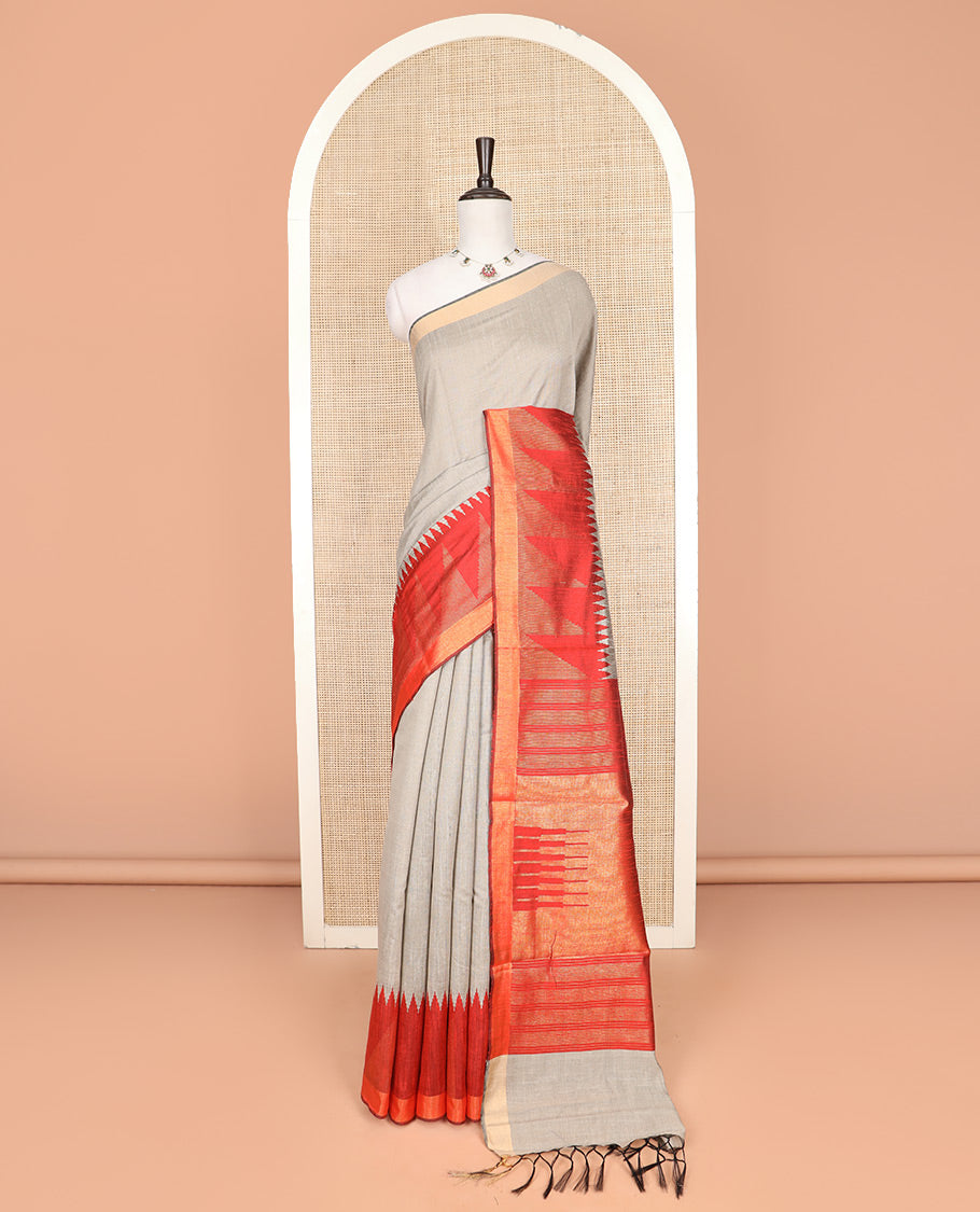 Grey Plain Dupion Silk Saree, Decorated with Contrast Temple Border, Pallu Steeped with Zari Temple Designs, and Paired with a Contrast Blouse