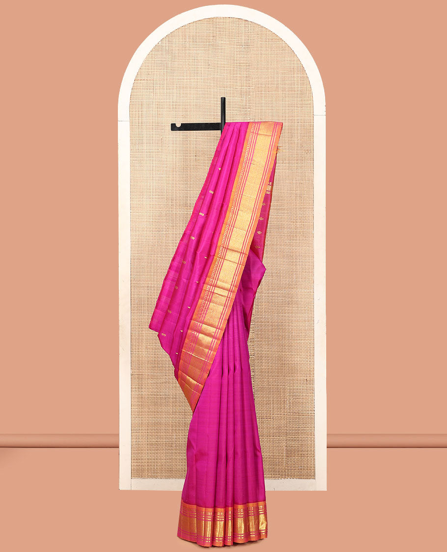 Rani Pink Kanchipuram Silk Saree Features Zari Buttas, a Contrast One-Sided Border of Paneer Sombu, Banaras, and Jaal Designs, Zari Design Pallu, and No Blouse