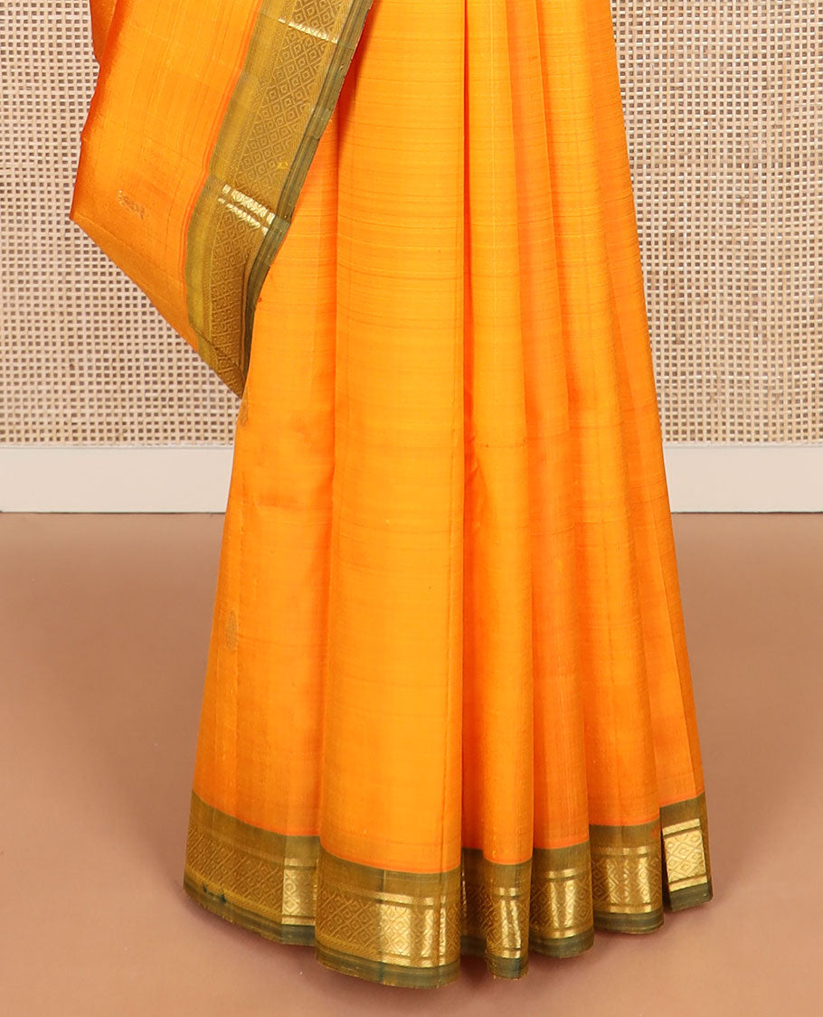 Yellow zari buttas kanchipuram silksaree, contrast one-sided border of banaras & mayil kann & zari design pallu